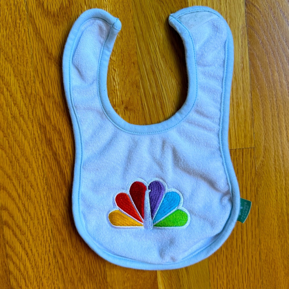 NBC Peacock Baby Bib with blue trim